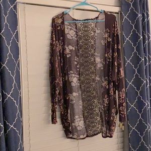 Purple floral cardigan with lace detail on back